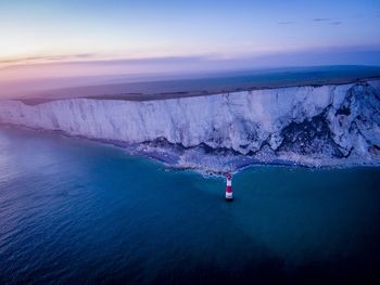 Scenic view of sea against sky at sunset