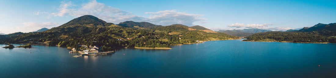 Panoramic view of bay against sky