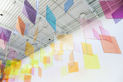 Low angle view of paper lanterns hanging on table