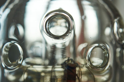 Close-up of glass of jar on table