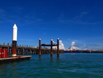 Scenic view of calm sea against clear sky