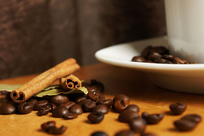 Close-up of coffee beans on table