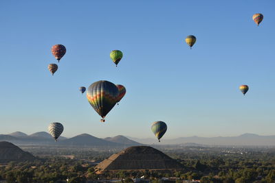 Hot air balloons flying in sky