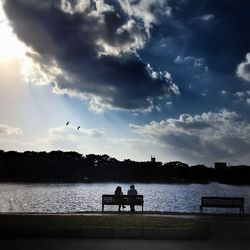 Reflection of people in water