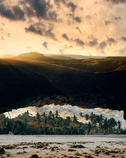 Scenic view of landscape against sky during sunset
