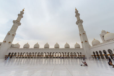 View of temple against building