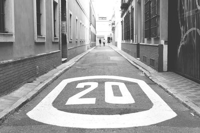 Road sign on street in city