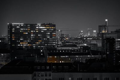 Illuminated buildings in city at night