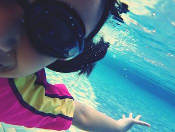 Woman swimming in sea
