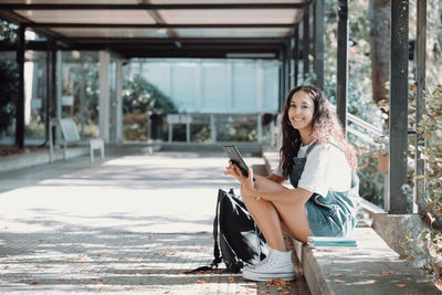 Young woman using mobile phone