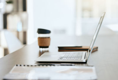 Close-up of laptop on table