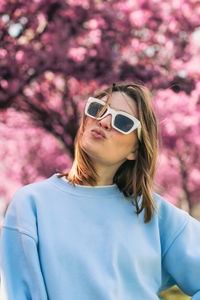 Young woman wearing sunglasses