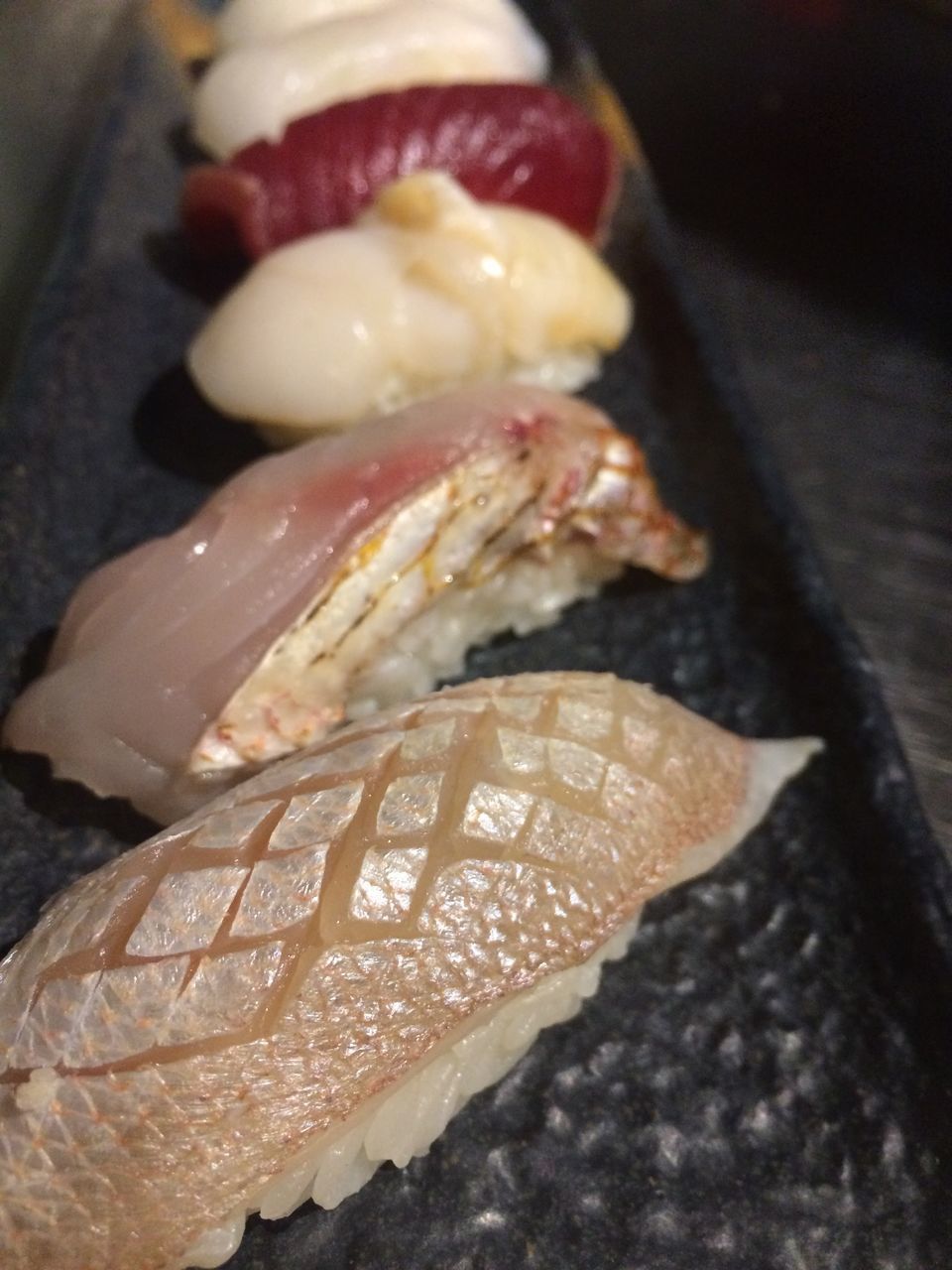 CLOSE-UP OF SUSHI SERVED IN PLATE