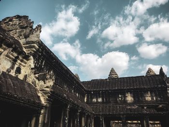 Low angle view of old building against sky