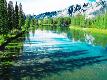 Scenic view of stream against rocky mountains at banff national park