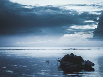 Boat on sea against sky