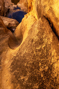 High angle view of rock formation in sea