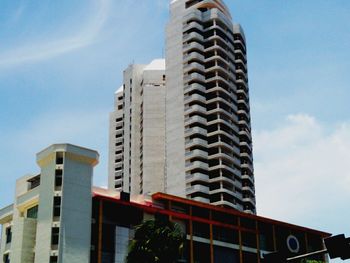 Low angle view of built structure against blue sky