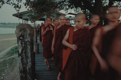 Rear view of people at temple