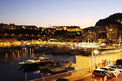 High angle view of illuminated marina at night