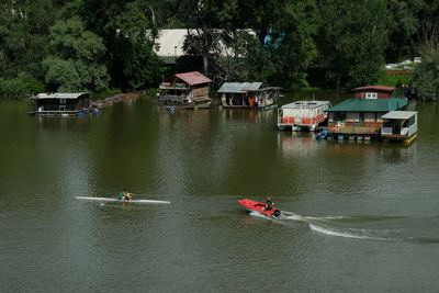 High angle view of people on boat in river