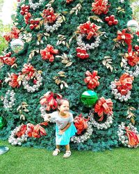 Girl standing on grass