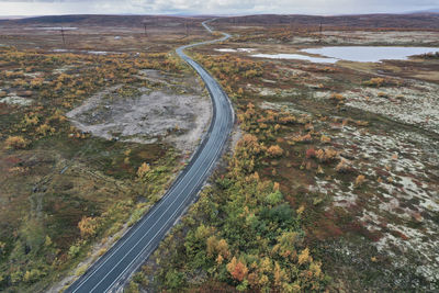 High angle view of road amidst land