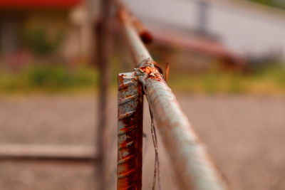 Close-up of rusty metal fence