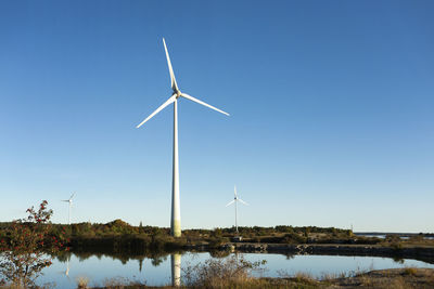 Wind turbine against sky