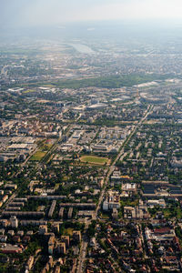 High angle view of buildings in city against sky