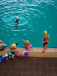 High angle view of people swimming in pool