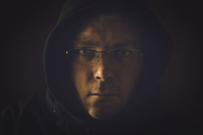 Close-up portrait of a serious young man