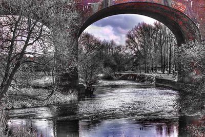 Arch bridge over river