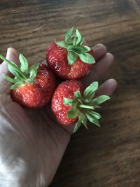 High angle view of strawberries on table