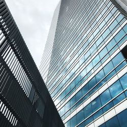 Low angle view of modern building against sky