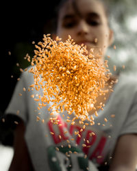 Close-up of grains in mid air