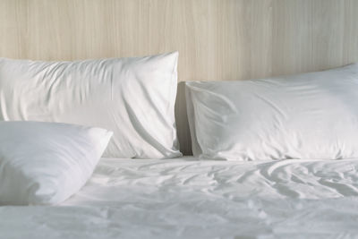 White blanket on bed at home