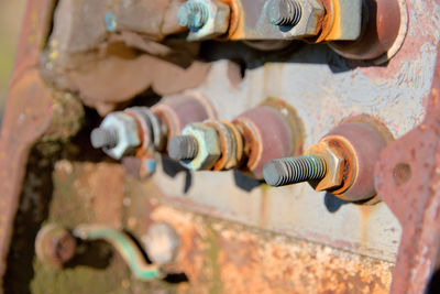 Close-up of rusty screws in control box