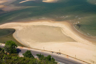 High angle view of road by sea