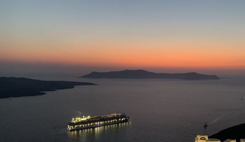 Scenic view of sea against clear sky during sunset