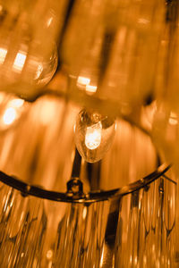 Low angle view of illuminated light bulb