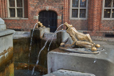 View of fountain in front of building