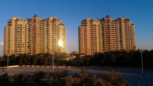 Modern buildings against blue sky