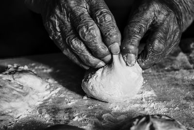 Close-up of person preparing food