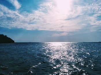 Scenic view of sea against cloudy sky