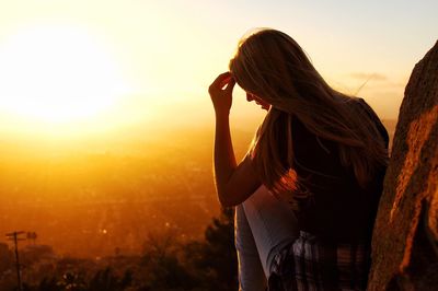 Woman at sunset