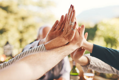 Cropped hand of woman holding hands