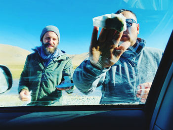 Portrait of man in car