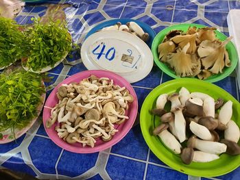 High angle view of mushrooms in plate on table