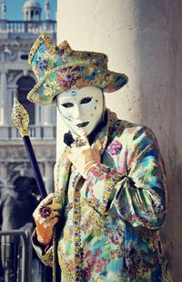 Man in carnival costume and mask during venice carnival